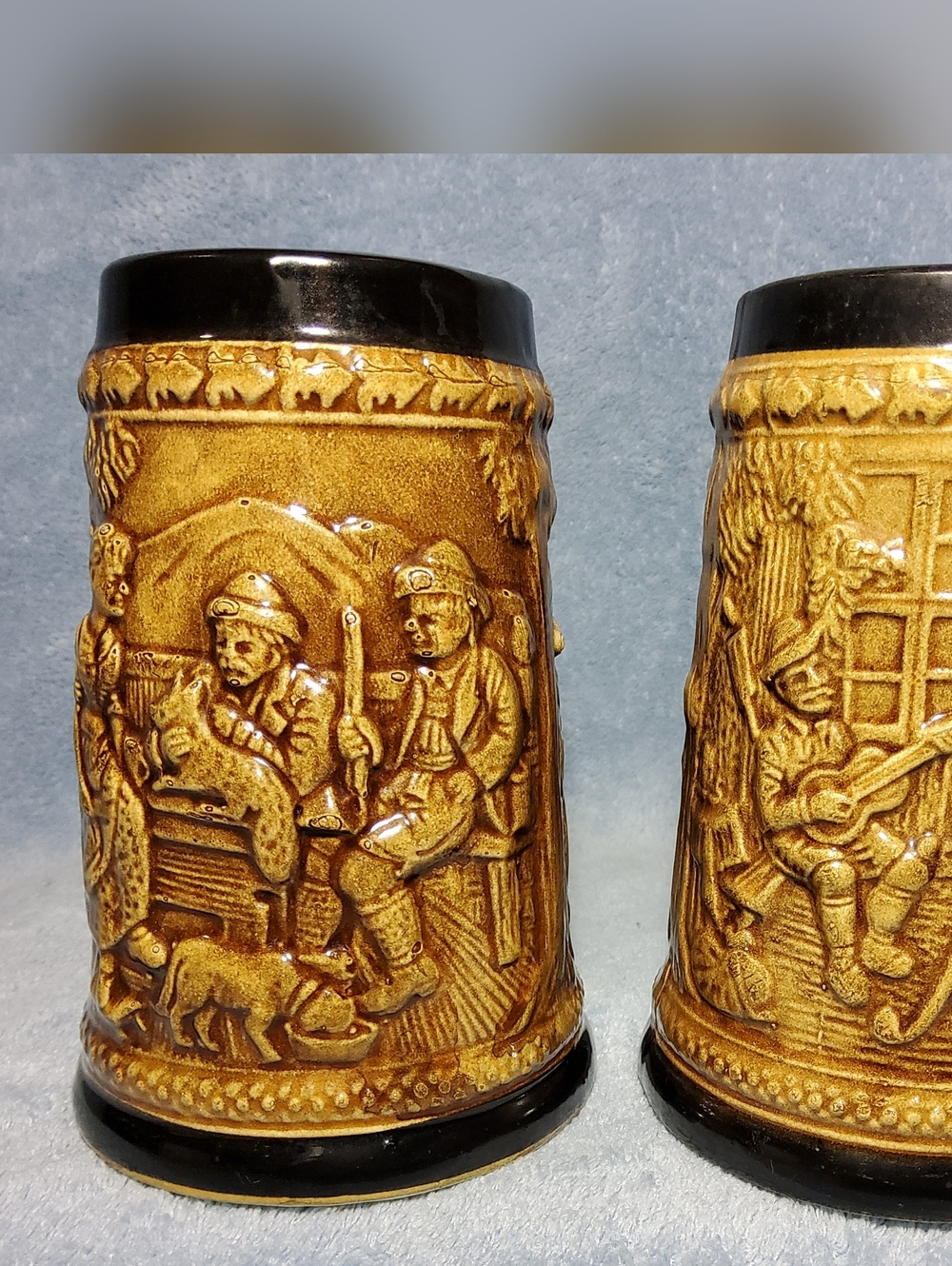 Vintage German Style Relief Beer Steins Mugs Set of 2 Brown Amber Deer Hunter